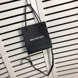 Handle and strap detail of modern chic women's handbag – women's luxury handbag
