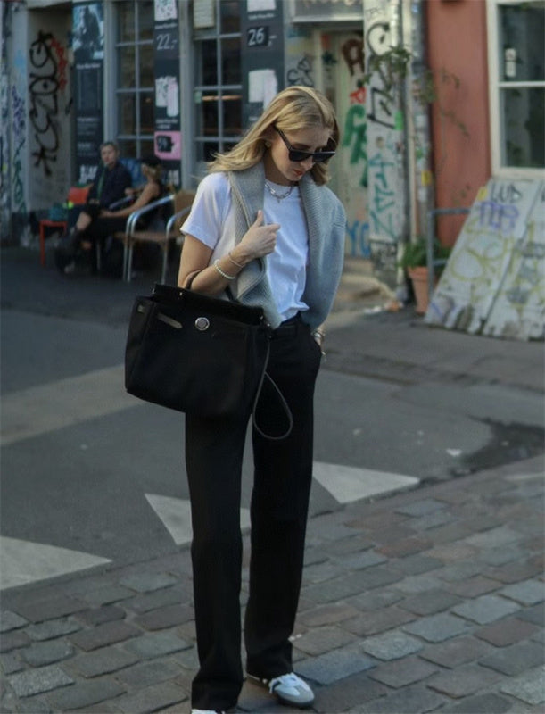 Side view of versatile structured handbag