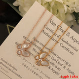 Side view of Van Cleef & Arpels unisex jewelry piece