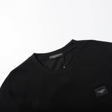 Close-up detail shot of Polo cotton polo shirt with signature branding