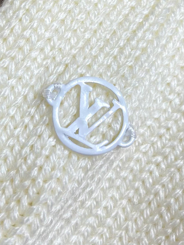 Side profile of Louis Vuitton luxury clothing with monogram-inspired silhouette