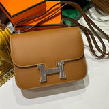 Side view of clean-lined structured handbag