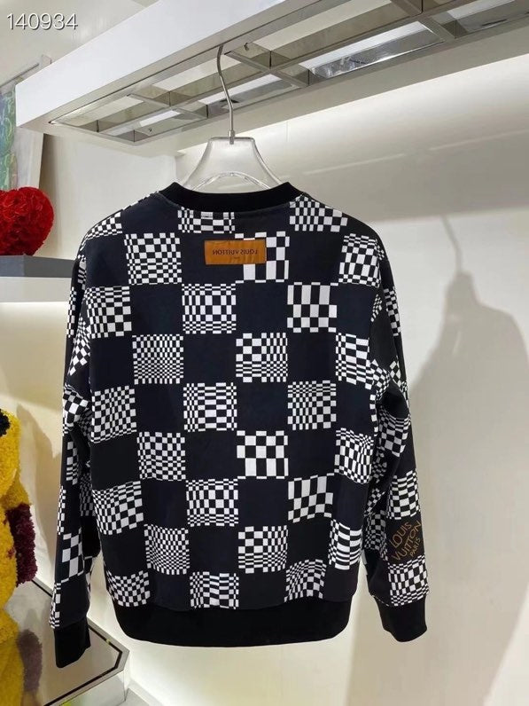 Back view of Louis Vuitton luxury clothing with runway-inspired design