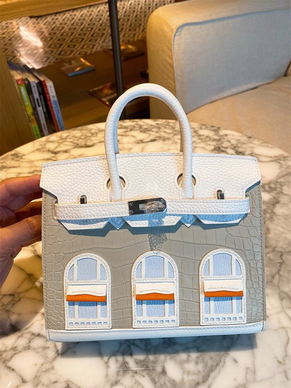 Side view of polished structured handbag