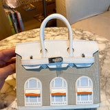 Side view of polished structured handbag