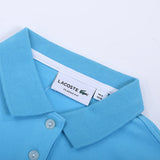 Side profile of Lacoste luxury clothing with signature branding