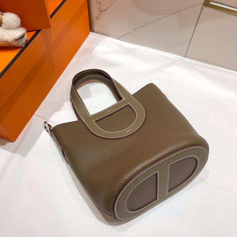Side view of classic structured handbag