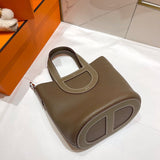 Side view of classic structured handbag