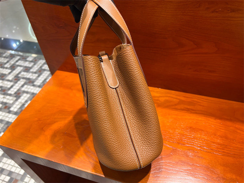 Side view of sophisticated structured handbag