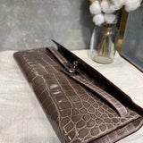 Side view of fluid structured handbag