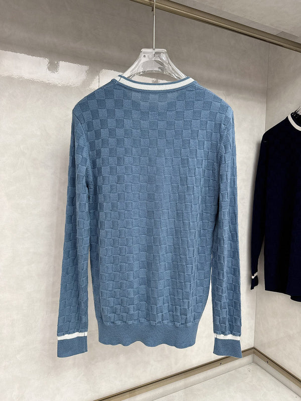 Side profile of Louis Vuitton luxury clothing with signature branding