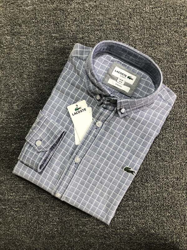 Side profile of Lacoste luxury clothing with logo-detail design