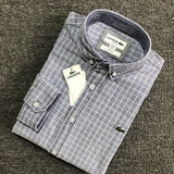 Side profile of Lacoste luxury clothing with logo-detail design
