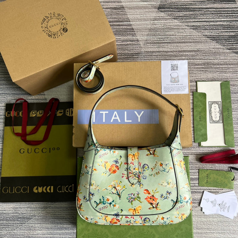 Styled lifestyle shot of everyday-luxe structured women's handbag – women's luxury accessory