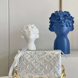 Side profile of statement refined women's handbag – women's premium purse