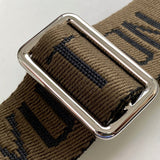 Handle and strap detail of structured polished women's handbag – women's designer-style accessory
