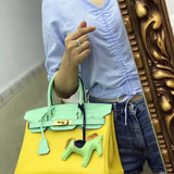 Side view of modern structured handbag