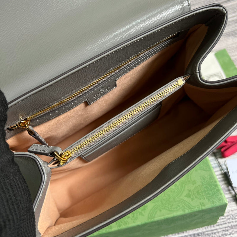 Side view of tailored structured handbag