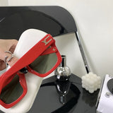 Angled view of Louis Vuitton unisex sunglasses