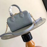  Understated crossbody bag carried on shoulder