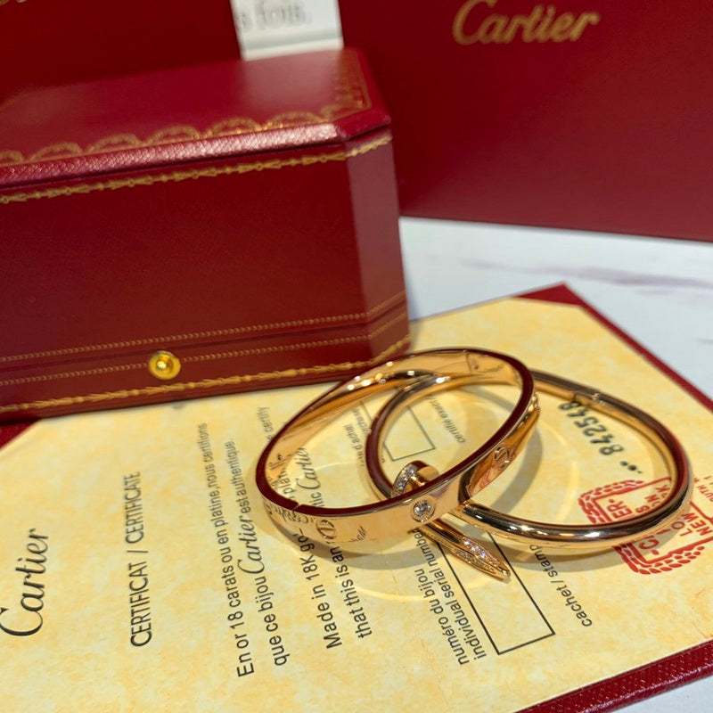 Side view of Cartier unisex jewelry piece