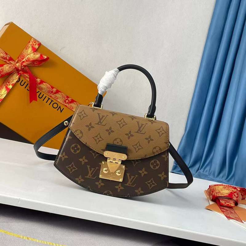 Side profile of signature polished women's handbag – women's premium purse