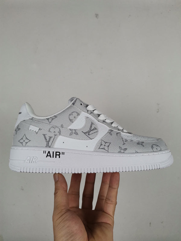 Side profile of Nike stone beige sneakers bold athletic profile