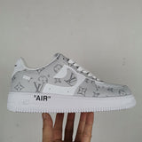 Side profile of Nike stone beige sneakers bold athletic profile