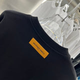Side profile of Louis Vuitton luxury clothing with relaxed-fit cut