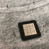 Close-up detail shot of Givenchy luxury clothing with contemporary cut