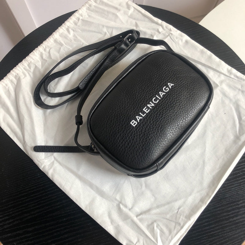 Front view of modern elevated women's handbag – women's statement bag