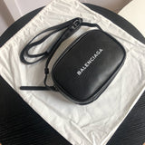 Front view of modern elevated women's handbag – women's statement bag