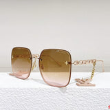 Close-up detail view of Louis Vuitton unisex sunglasses