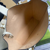 Side profile of everyday-luxe structured women's handbag – women's luxury handbag