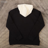 Side profile of Louis Vuitton luxury clothing with tailored silhouette