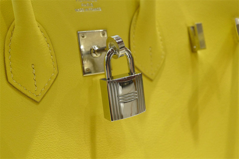 Side view of modern structured handbag