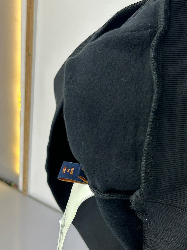 Side profile of Louis Vuitton luxury clothing with relaxed-fit cut