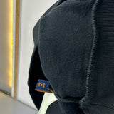 Side profile of Louis Vuitton luxury clothing with relaxed-fit cut