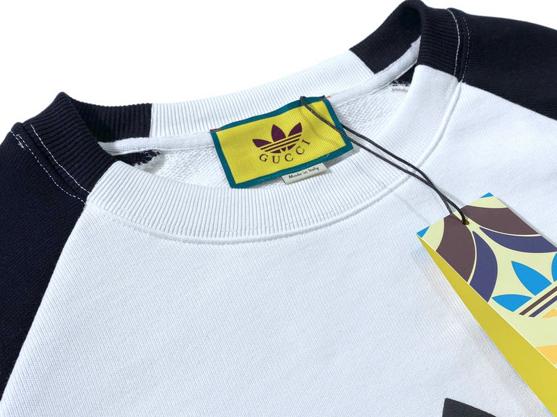 Close-up detail shot of Gucci luxury clothing with tailored silhouette