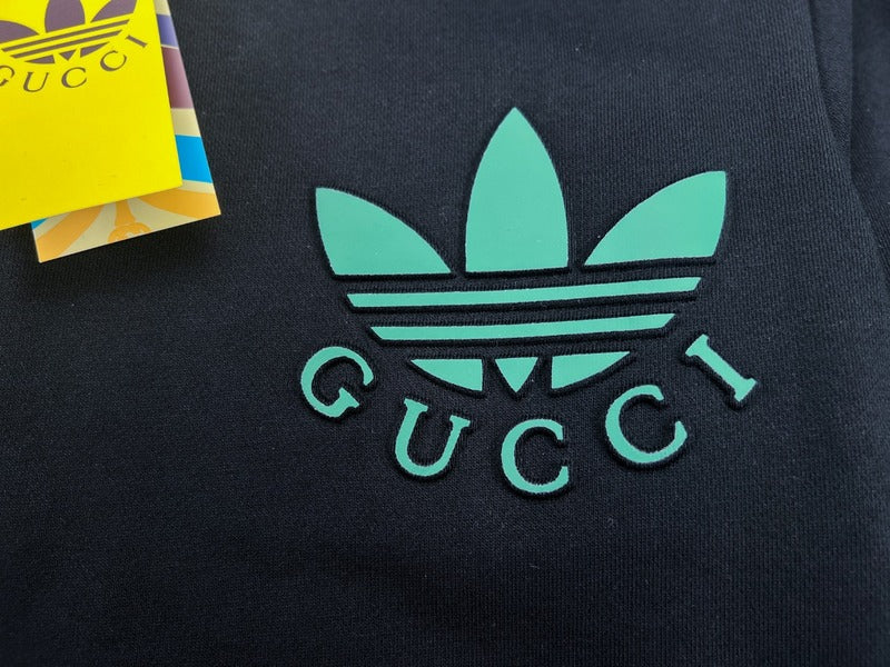 Back view of Gucci luxury clothing with signature branding