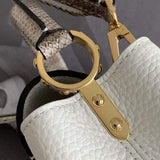 Handle and strap detail of polished chic women's handbag – women's luxury accessory