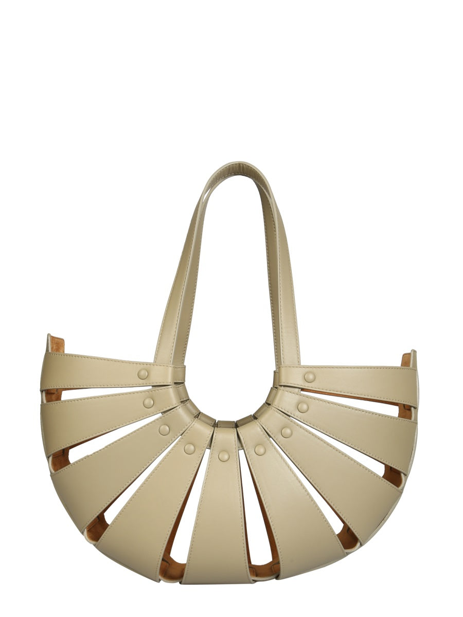 Close-up of Bottega Veneta shoulder bags hardware and fine stitching
