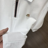 Back view of Moncler luxury clothing with signature branding