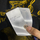 Side profile of Louis Vuitton luxury clothing with runway-inspired design