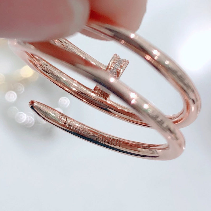Side view of Cartier unisex jewelry piece