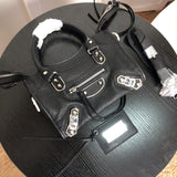 Top view of elevated polished women's handbag – women's luxury accessory