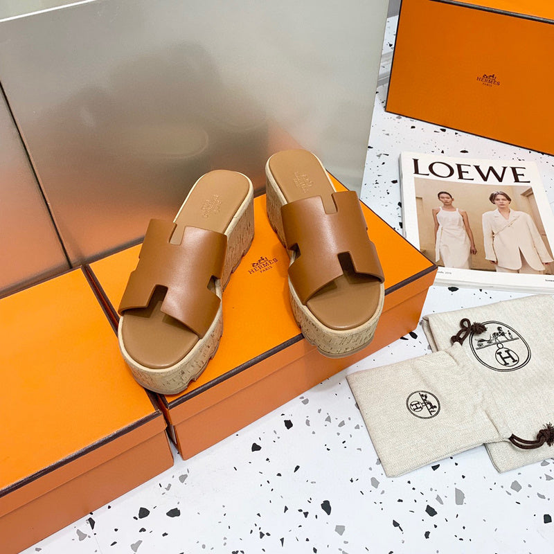 Hermes sandals Style 158 - close-up of iconic logo design