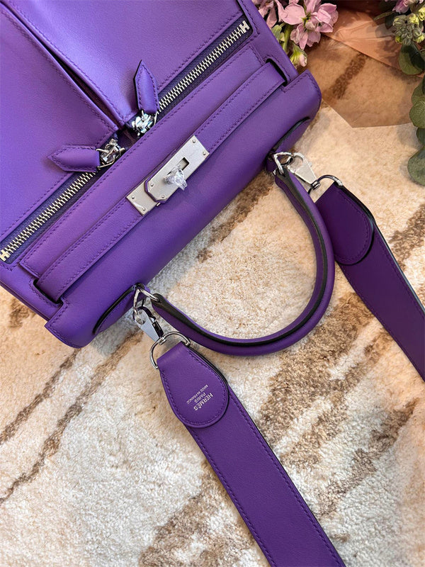 Side view of streamlined structured handbag