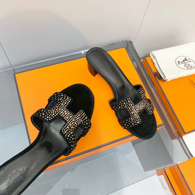 Hermès Black Ankle Strap Sandals - Lifestyle Styling Shot