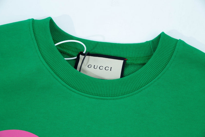 Close-up detail shot of Gucci luxury clothing with relaxed-fit cut